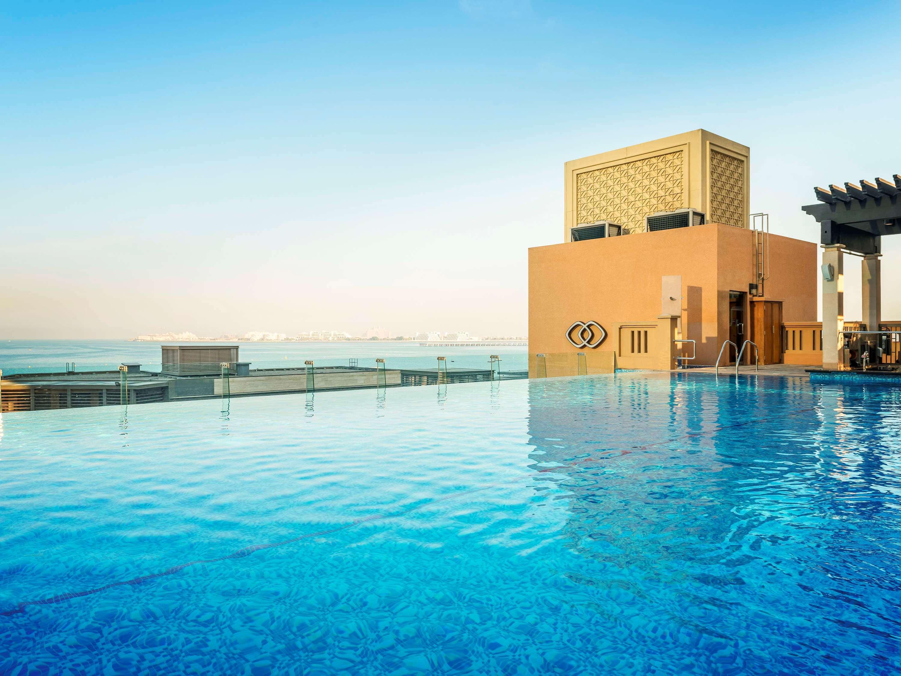 Sofitel Dubai Jumeirah Beach Hotel Exterior photo The pool at Jumeirah Jumeirah